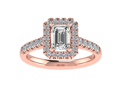 Emerald cut Ring with diamond halo and diamond set shoulders 8x6mm